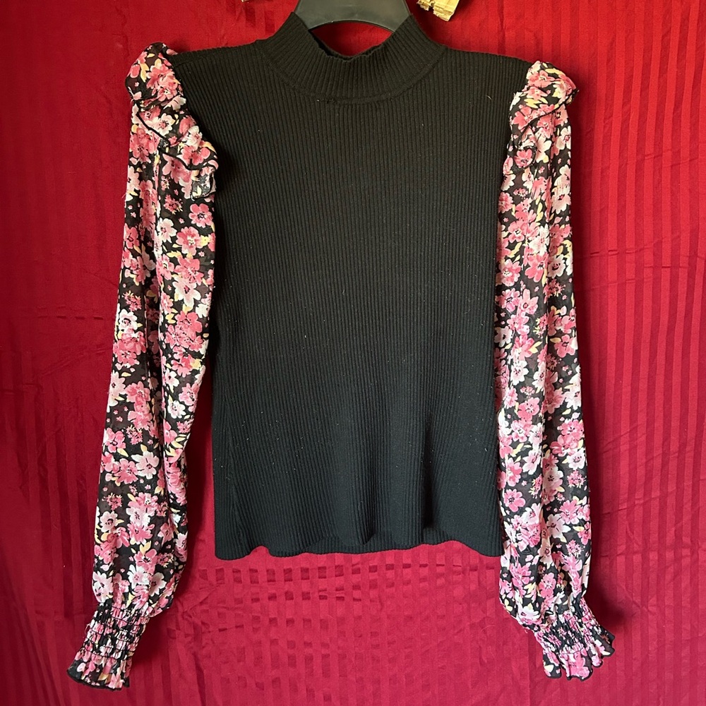 Chic Black Top with Floral Sleeves